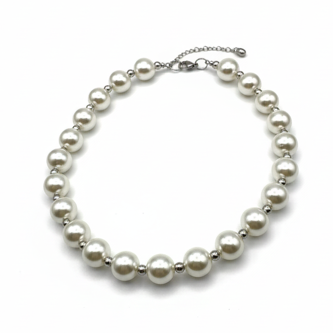 Pearl choker necklace with silver accents, classic with a playful touch_still