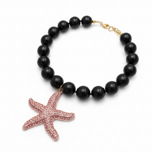 Black obsidian bead necklace with pink starfish pendant and sparkling rhinestones_still