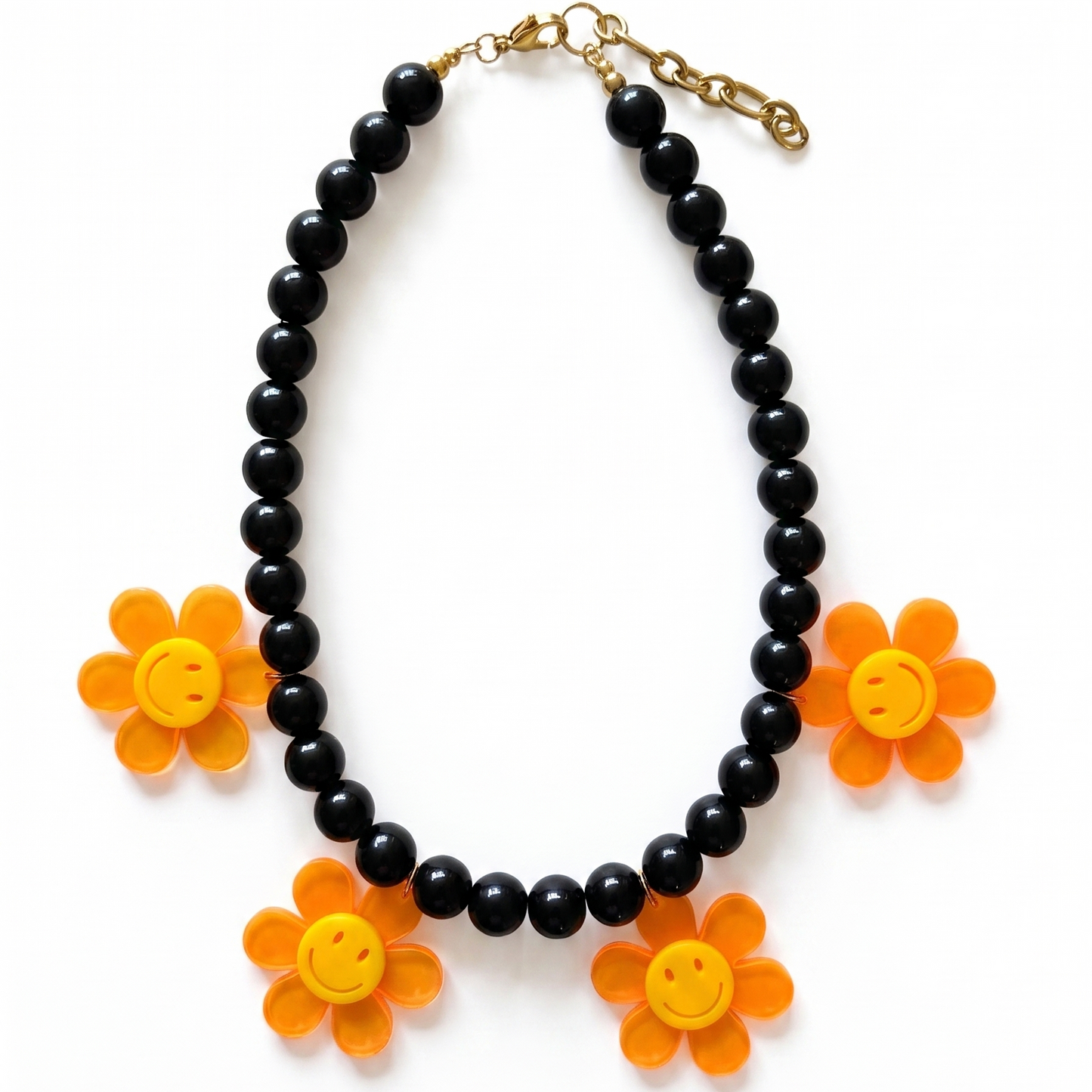 Statement necklace with black beads and neon flower pendants, handmade jewellery