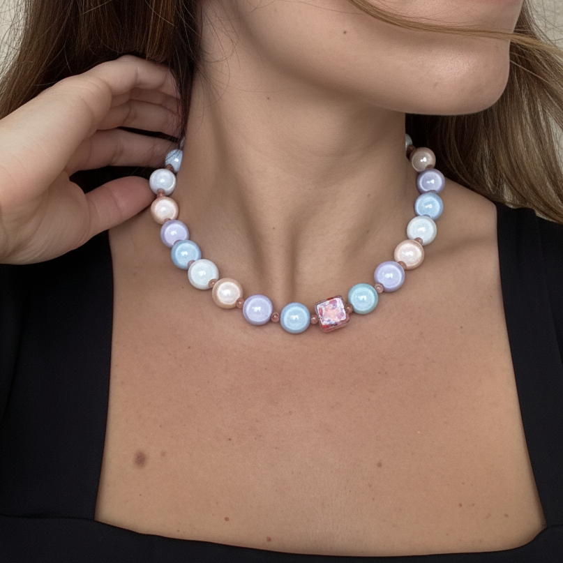 Handmade statement necklace featuring rounded reflective beads