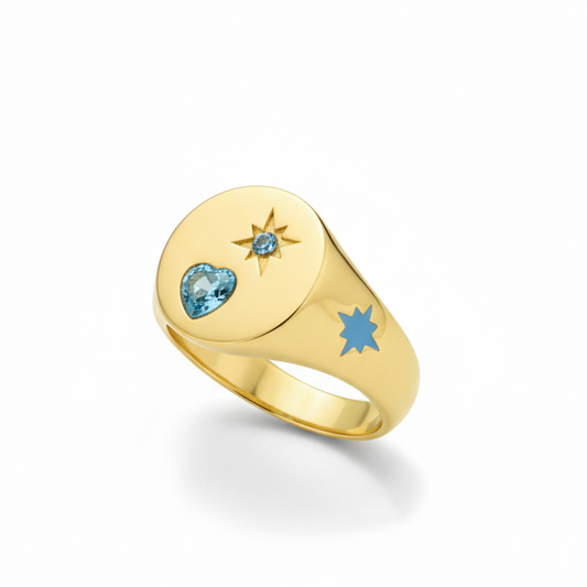 Gold ring with blue gemstones 