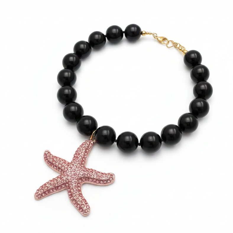 Black obsidian bead necklace with pink starfish pendant and sparkling rhinestones_still