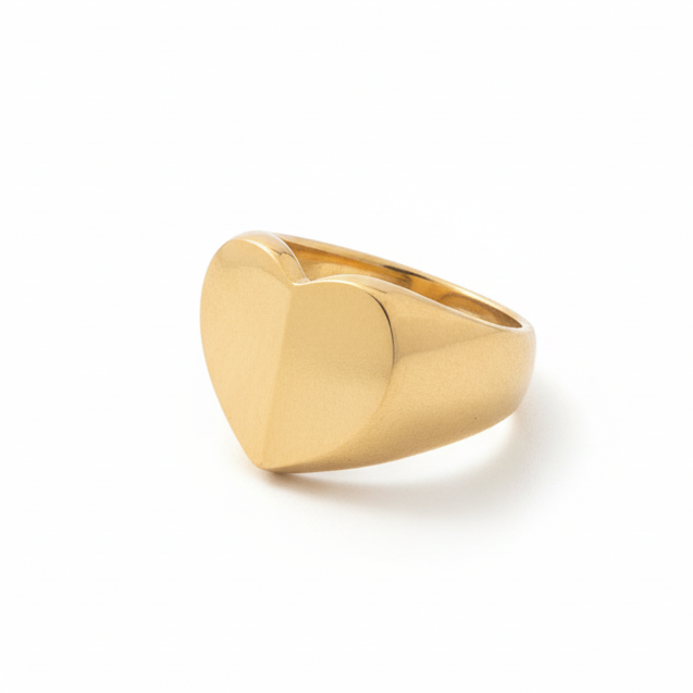 Chunky gold earrings in a heart shape_still