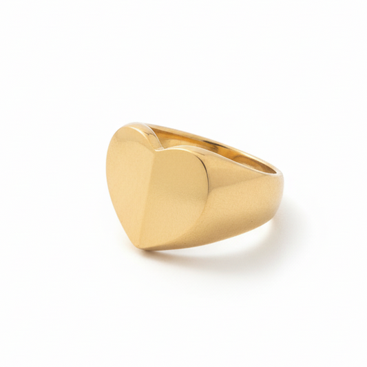 Chunky gold earrings in a heart shape_still