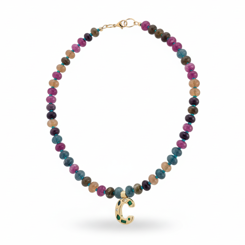 Necklace made with colorful beads and a personalized initial pendant_still