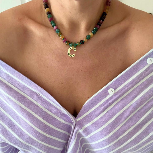 Necklace made with colorful beads and a personalized initial pendant