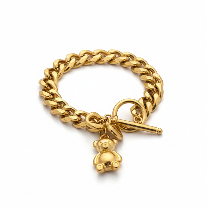 Gold chain bracelet with a teddy bear charm 