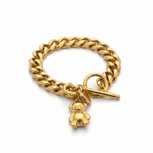 Gold chain bracelet with a teddy bear charm 